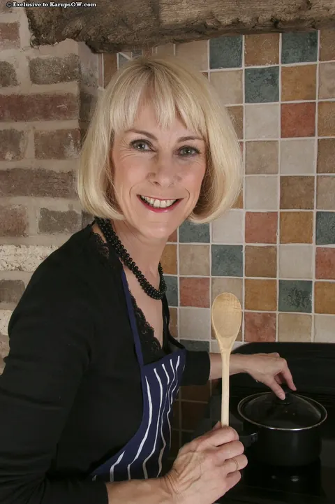 Hazel May: Thick Mature Blonde Spreads Her Hairy Pussy in the Kitchen – photo 1 of 16