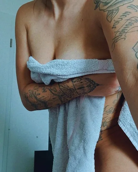 Busty Tattooed Babe Spreads in the Bathroom Mirror – photo 17 of 19