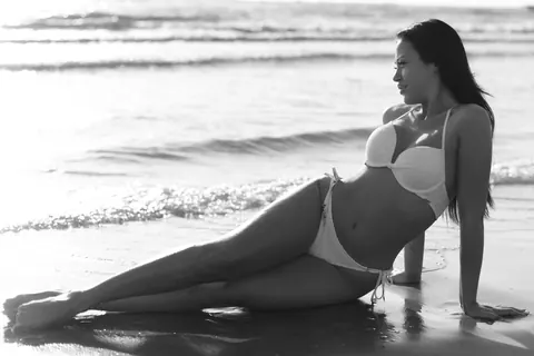 Julia Joy: Brunette in a Bikini Poses on the Beach Showing Her Tattoo – photo 12 of 16