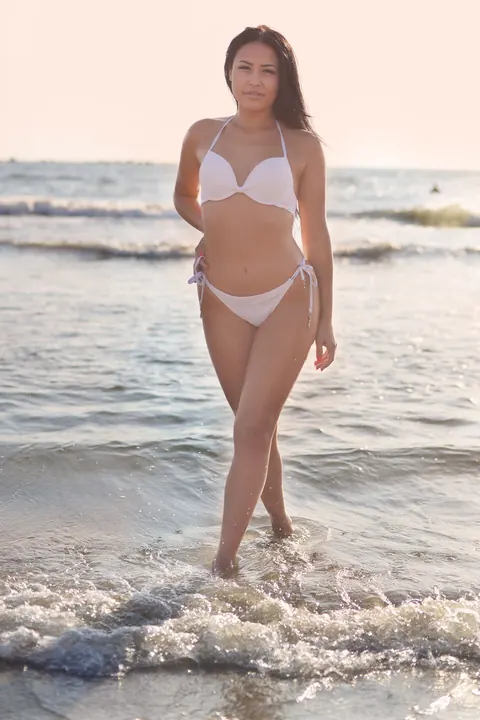 Julia Joy: Brunette in a Bikini Poses on the Beach Showing Her Tattoo – photo 14 of 16