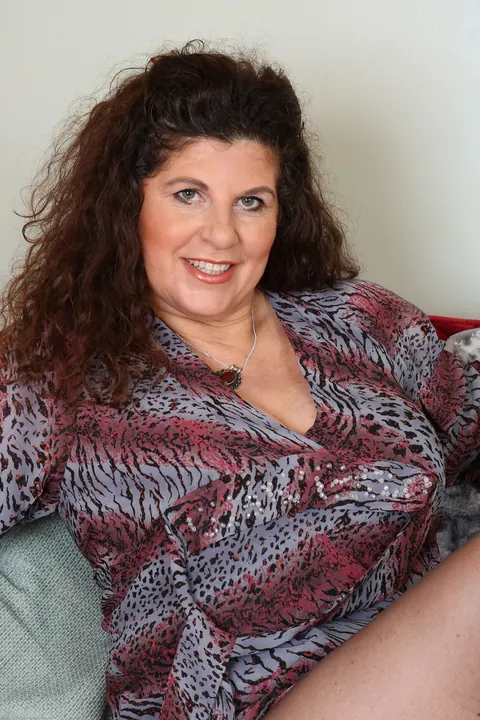 Gilly Sampson: Mature Brunette in Lingerie Shows Off Her Big Tits – photo 2 of 21