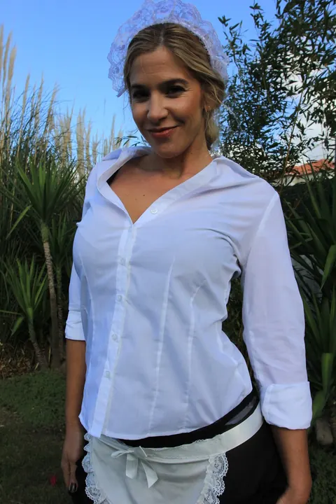 CAROL FERRER: Blonde MILF Maid Shows Off Her Bubble Butt in Stockings Outdoors – photo 2 of 17