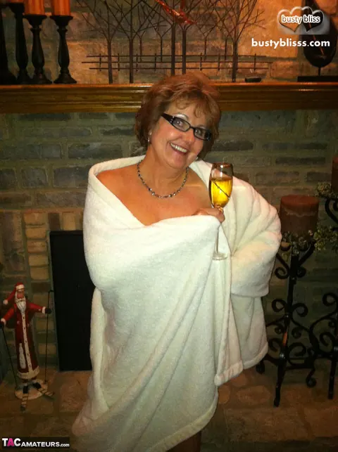 Bustybliss: Mature Brunette Shows Her Big Natural Tits by the Fireplace – photo 4 of 16