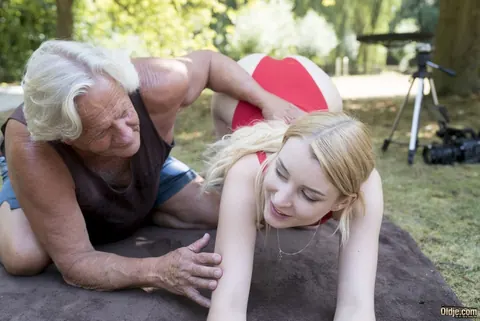 Amaris: Slim Blonde in a Bodysuit Rides Her Partner Outdoors – photo 4 of 21
