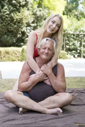 Slim Blonde in a Bodysuit Rides Her Partner Outdoors