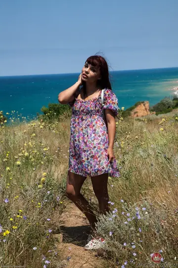 Petite Redhead Pulls Panties Aside and Spreads Her Pussy on the Beach