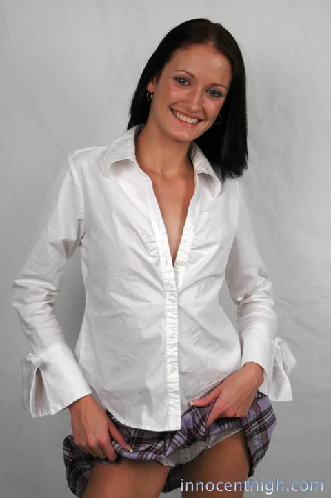 Slim Brunette MILF Lifts Her Uniform to Show White Panties – photo 9 of 16
