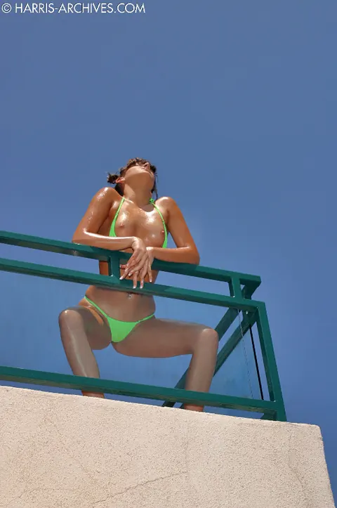 Kinzie Kenner: Brunette MILF Oils Her Small Enhanced Tits in a Bikini Outdoors – photo 5 of 15
