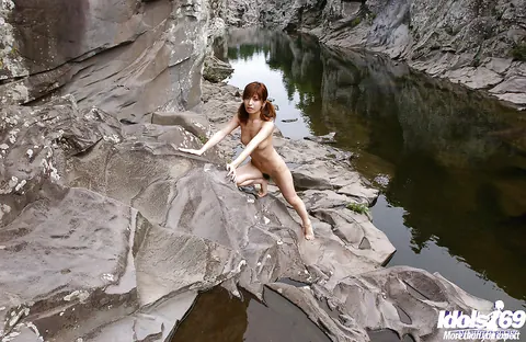An Nanba: Thick Japanese Brunette Stands Naked Outdoors and Spreads Her Hairy Pussy – photo 14 of 16