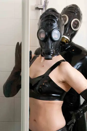 Thick European MILF in Latex and Lingerie Kisses Her Partner in the Bathroom