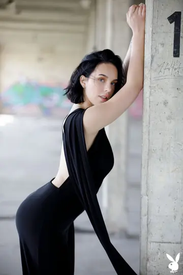 German Brunette in High Heels Spreads Outdoors