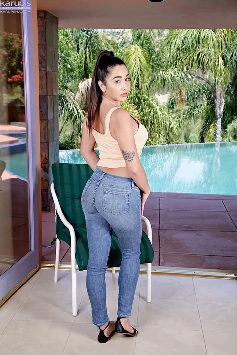 Karlee Grey: Tattooed Brunette Peels Off Her Jeans and Bikini by the Pool – photo 2 of 18