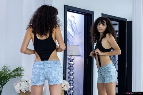 European Brunette Strips Out of Her Shorts at the Mirror – photo 5 of 21