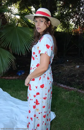 Brunette MILF Strips Out of Her Lingerie and Shows Her Trimmed Pussy Outdoors