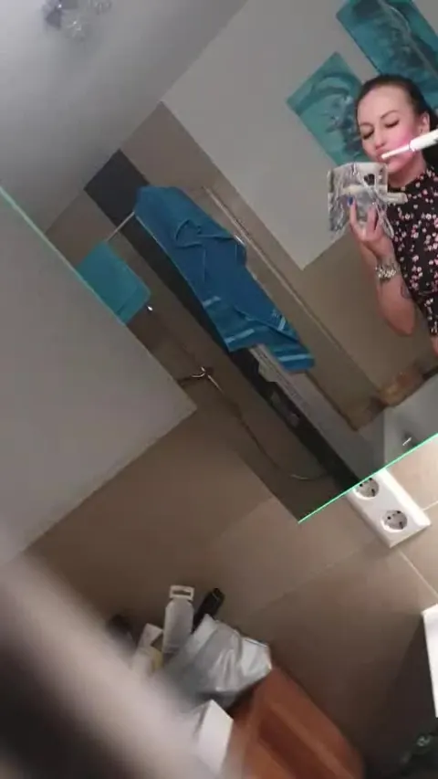 Woman Strips Nude and Poses in the Bathroom – photo 4 of 12