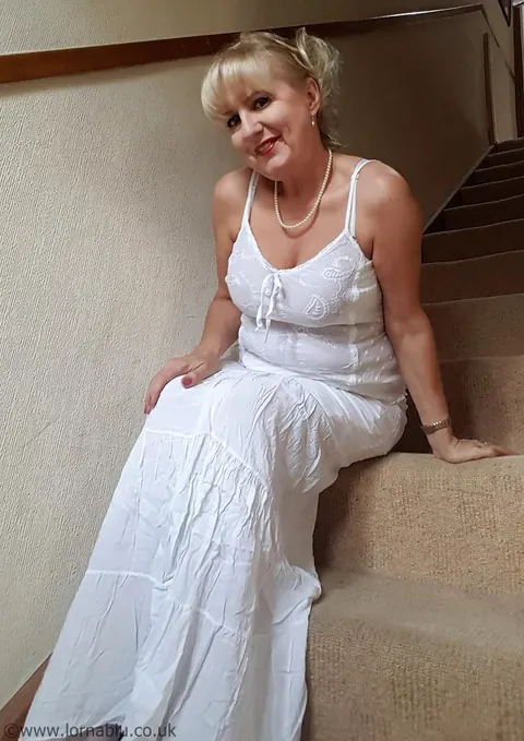 Lorna Blu: British Blonde MILF Flaunts White Lingerie and Stockings – photo 1 of 15