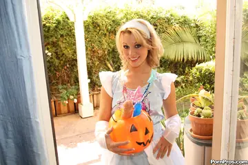 Blonde MILF Plays with a Dildo Outdoors on Halloween