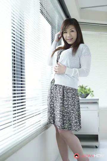 Curvy Japanese Woman Reveals Her Big Tits in a Skirt
