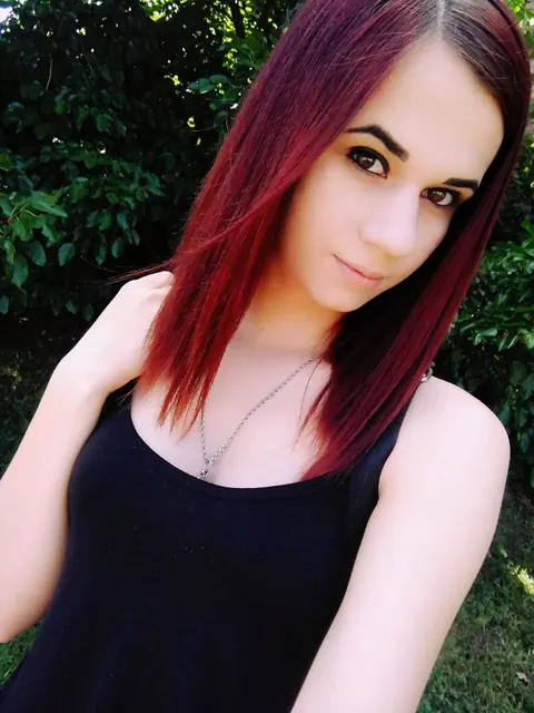 Outdoors, a Skinny Redhead in Lingerie Spreads for the Camera – photo 11 of 17