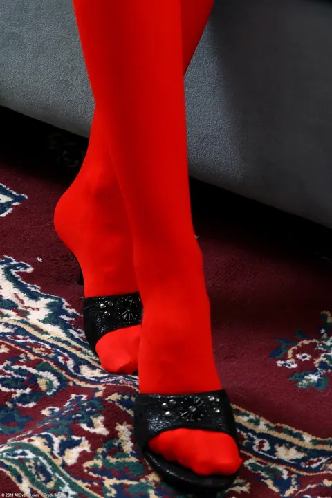 Curly Blonde MILF in Stockings Sucks Her Toes on the Sofa – photo 1 of 21