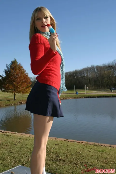 Jana Jordan: Skinny Blonde Flashes in a Short Skirt Outdoors – photo 9 of 12