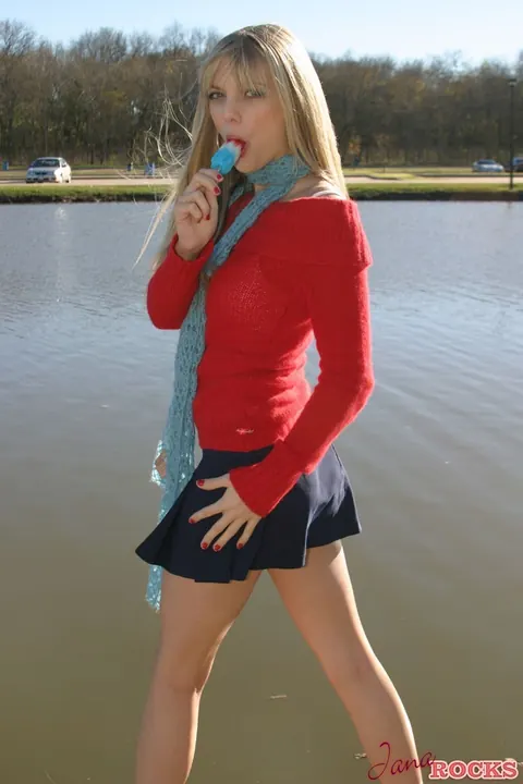 Jana Jordan: Skinny Blonde Flashes in a Short Skirt Outdoors – photo 7 of 12