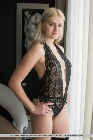 European Blonde in Lingerie and Stockings Shows Her Hairy Bush