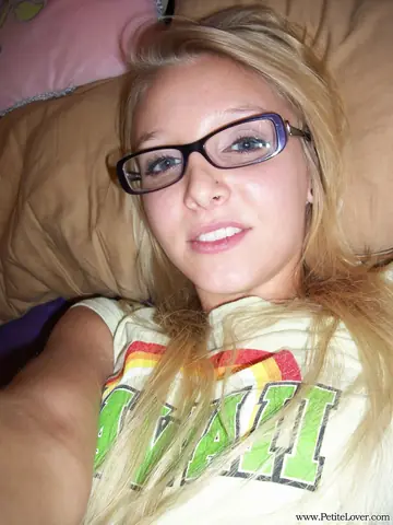 Blonde with Big Tits Spreads in Glasses and Shorts