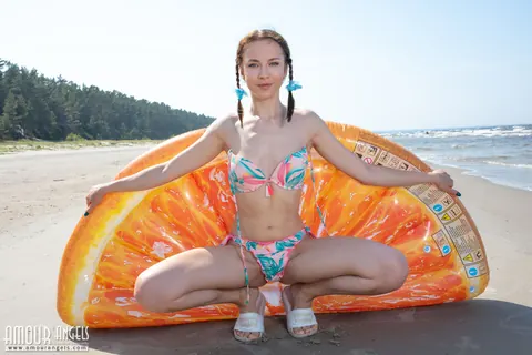 Slim Woman with Pigtails Strips Nude and Spreads on the Beach – photo 4 of 20