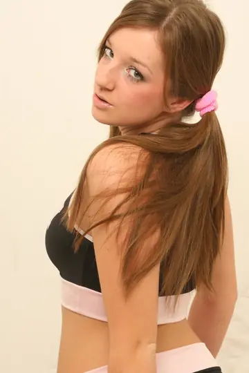 European Brunette in Pigtails Takes Two Cocks and a Facial