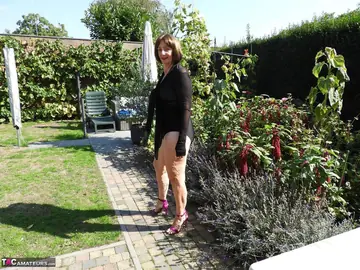 Curvy European MILF Undresses on a Backyard Hammock
