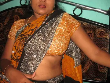 Mature Indian Woman Undresses and Spreads Her Pussy