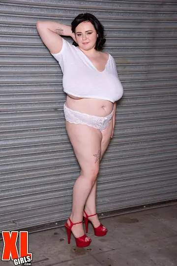 BBW Brunette with Short Hair Oils Up Her Huge Natural Tits and Big Ass