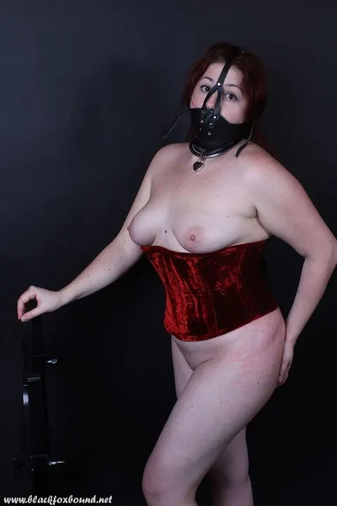 Curvy Redhead MILF Wears Nipple Clamps and Gag in Leather – photo 6 of 16