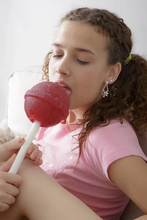 Two Lesbians Share a Lollipop and Eat Each Other Out – photo 1 of 21