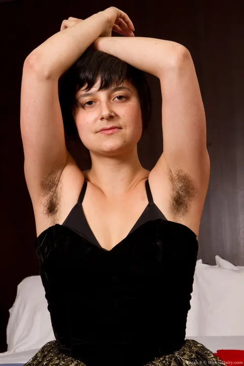 Busty Black-Haired Woman Pulls Panties Aside to Show Hairy Armpits and Pussy – photo 1 of 19