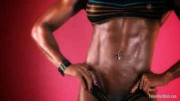 Alexis Ellis – Ebony Bodybuilder Oils Her Bikini Body and Bares Her Ass
