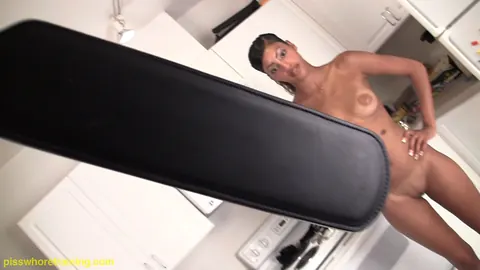Ebony Woman Spreads Her Shaved Pussy and Pisses in the Kitchen – photo 2 of 15