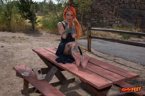 Quinn Carter: Redhead in a Skirt and Heels Exposes Her Feet Outdoors – photo 13 of 21