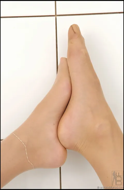 Caroline Cage: Hungarian Lesbian Nurses in Stockings Play with a Butt Plug and Feet – photo 4 of 21