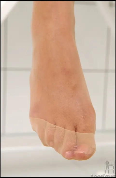 Caroline Cage: Hungarian Lesbian Nurses in Stockings Play with a Butt Plug and Feet – photo 2 of 21