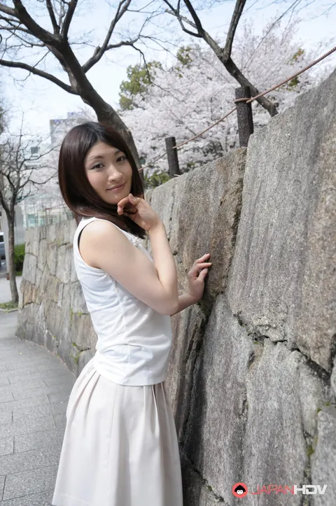 Japanese Brunette Poses Outdoors in a Skirt and High Heels – photo 14 of 15