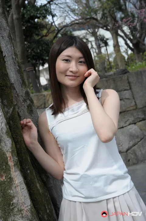 Japanese Brunette Poses Outdoors in a Skirt and High Heels – photo 3 of 15