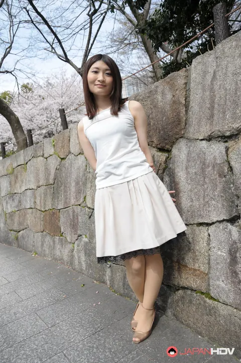 Japanese Brunette Poses Outdoors in a Skirt and High Heels – photo 10 of 15