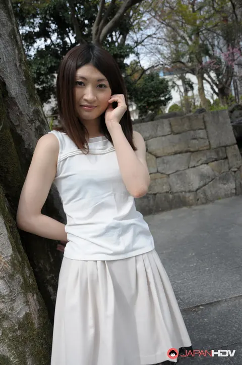 Japanese Brunette Poses Outdoors in a Skirt and High Heels – photo 5 of 15
