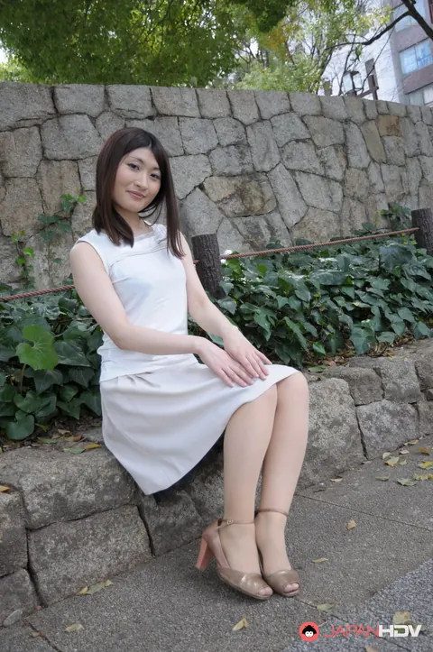 Japanese Brunette Poses Outdoors in a Skirt and High Heels – photo 15 of 15