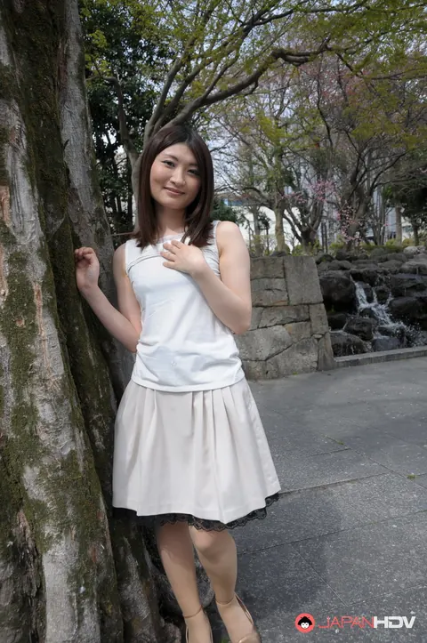 Japanese Brunette Poses Outdoors in a Skirt and High Heels – photo 4 of 15
