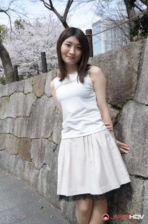Japanese Brunette Poses Outdoors in a Skirt and High Heels – photo 9 of 15