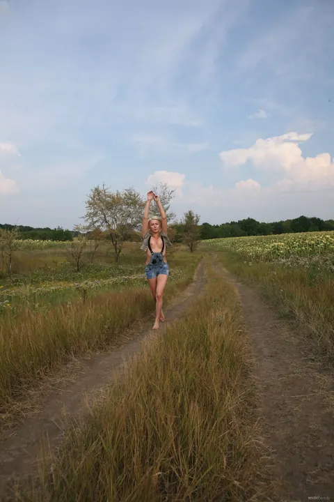 Rina D: Blonde with Big Natural Tits Strips Nude and Spreads Outdoors – photo 5 of 21