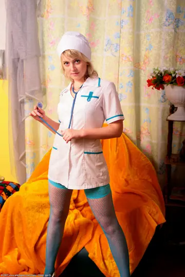 Hairy Woman in Stockings and Uniform Strips and Fingers Herself